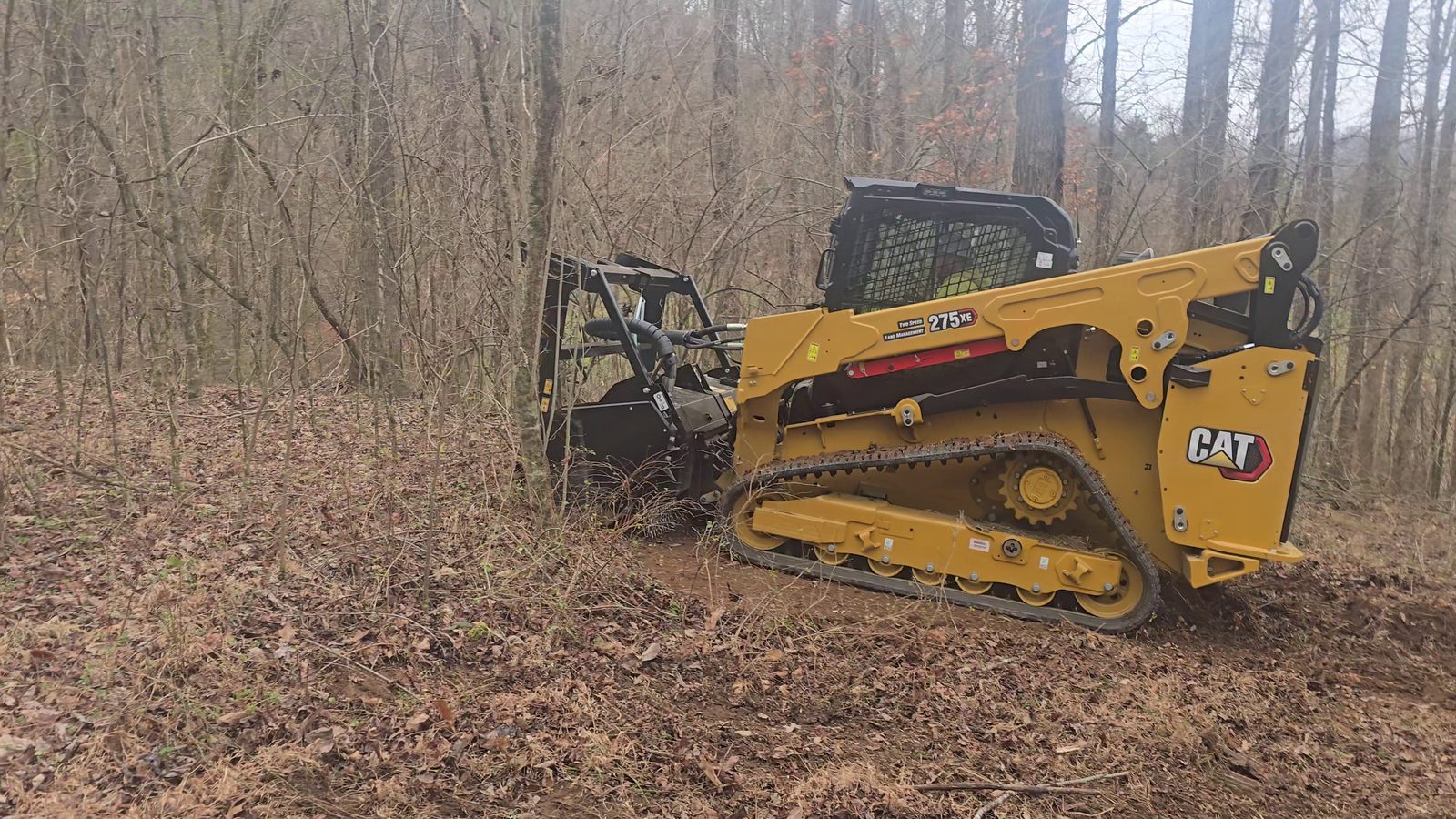 CAT 275-05XE with HM418 forestry mulcher attachment on an Upper Cumberland clearing job