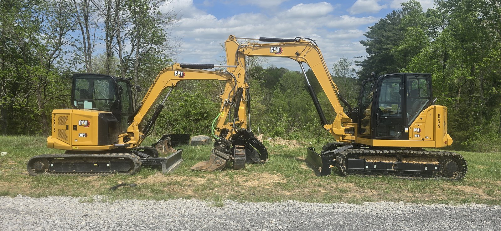 CAT 305-07CR and CAT 308-08CR mini excavators staged for a PGS jobsite